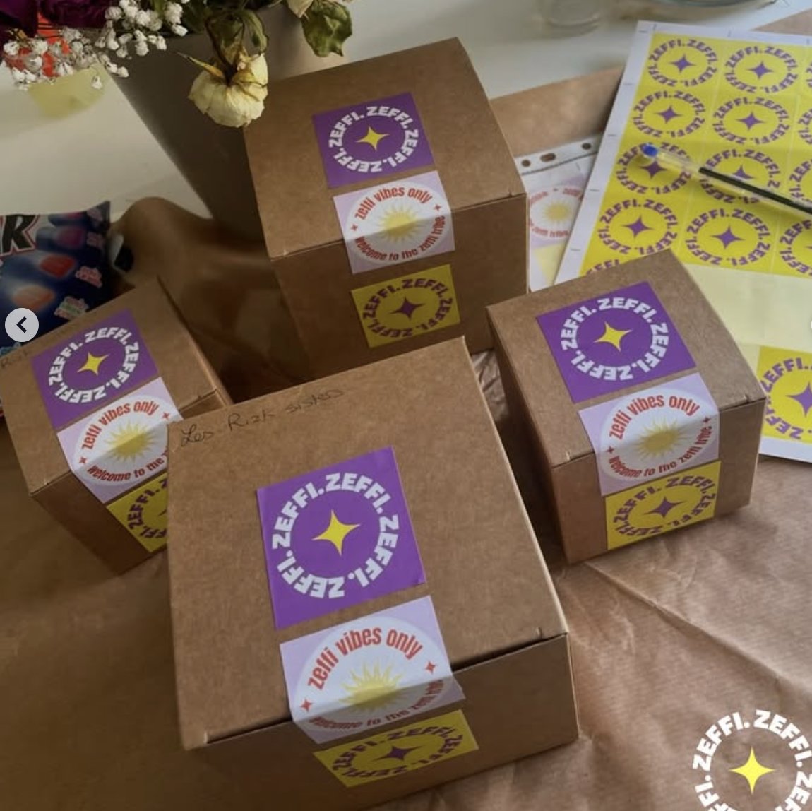 Kraft boxes sealed with Zeffi stamp stickers